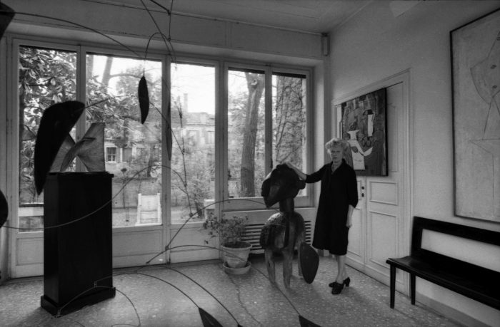 Peggy Guggenheim in the entrance to Palazzo Venier dei Leoni, Venice.