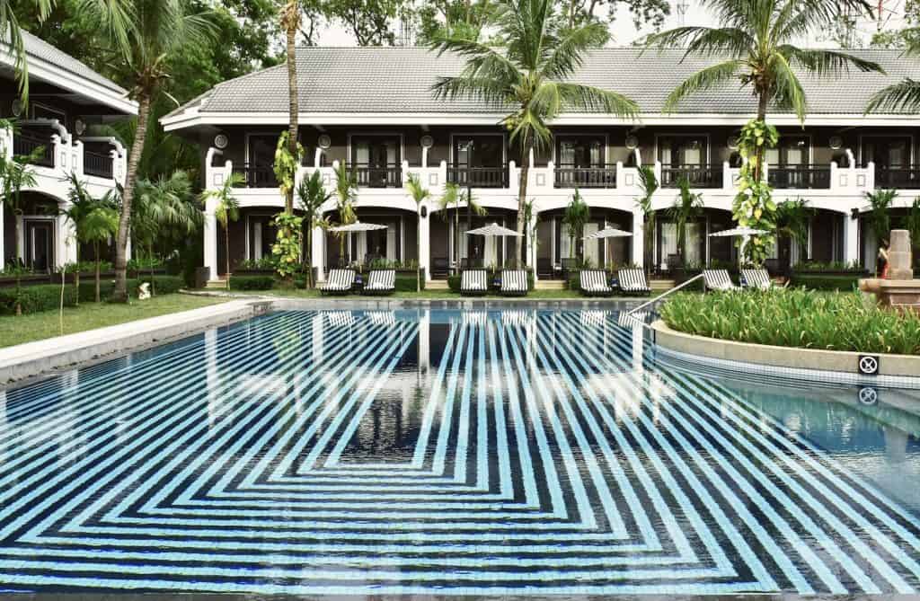 Shinta Mani Angkor The 23m striped swimming pool of the Bayon Wing, Shinta Mani Angkor, Cambodia.