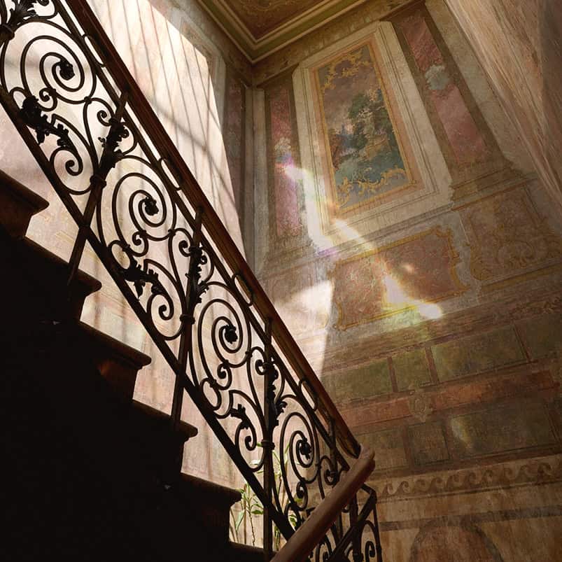 Unfound Door. Original Belle Époque murals in the staircase entrance of Tbilisi boutique hotel, Unfound Door.