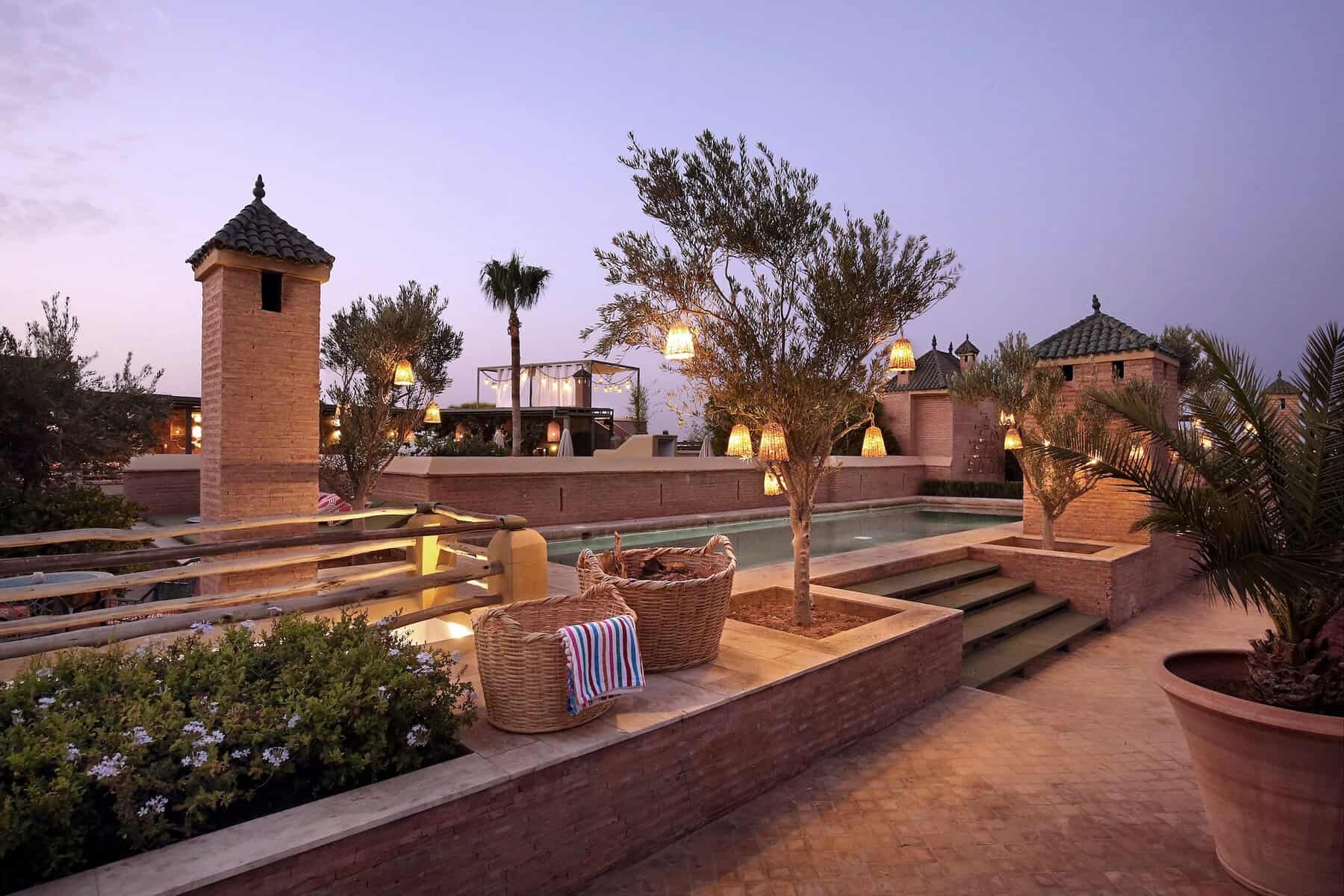El Fenn's 1,300m2 room terrace features a bar, restaurant and swimming pool overlooking Koutoubia Mosque and the Marrakech Medina.