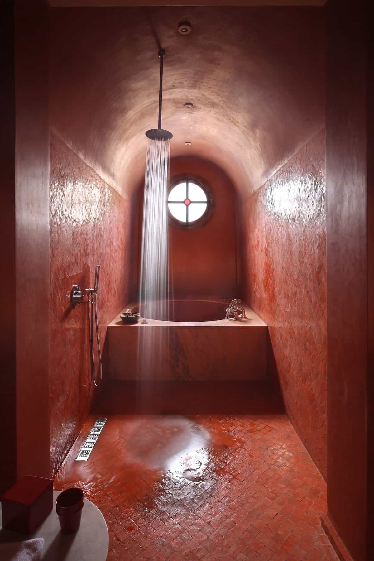 A tadelakt bathroom resembles a hammam in one of the larger suites at El Fenn, a boutique hotel in the Marrakech Medina, Morocco.