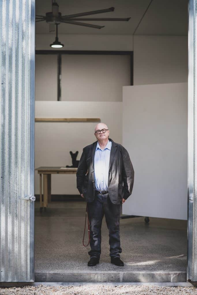 Michael Reid in the doorway of his Murrurundi art gallery.
