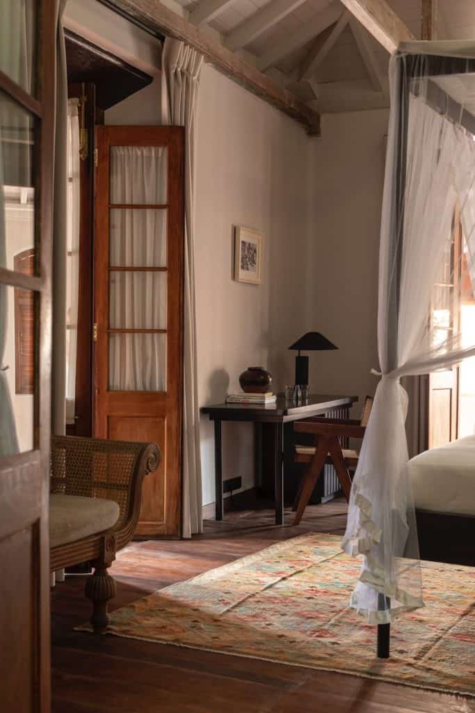 fort-printers-heritage-bedroom Heritage room with desk and four poster bed, The Fort Printers, Galle.