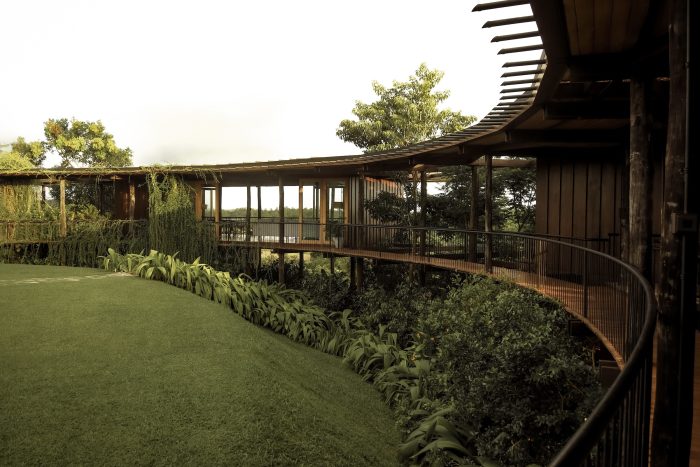 Trebartha East:The Roundhouse, designed by Professor Narein Perera. Rooms are linked by a circular veranda.