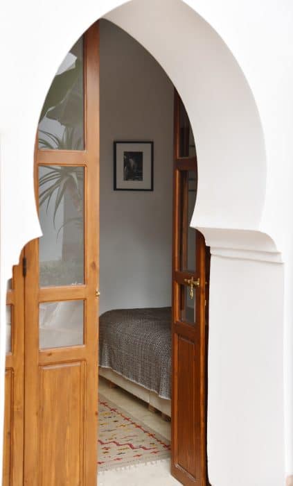 Keyhole-arch doorway to bedroom, Riad UP, Marrakech.