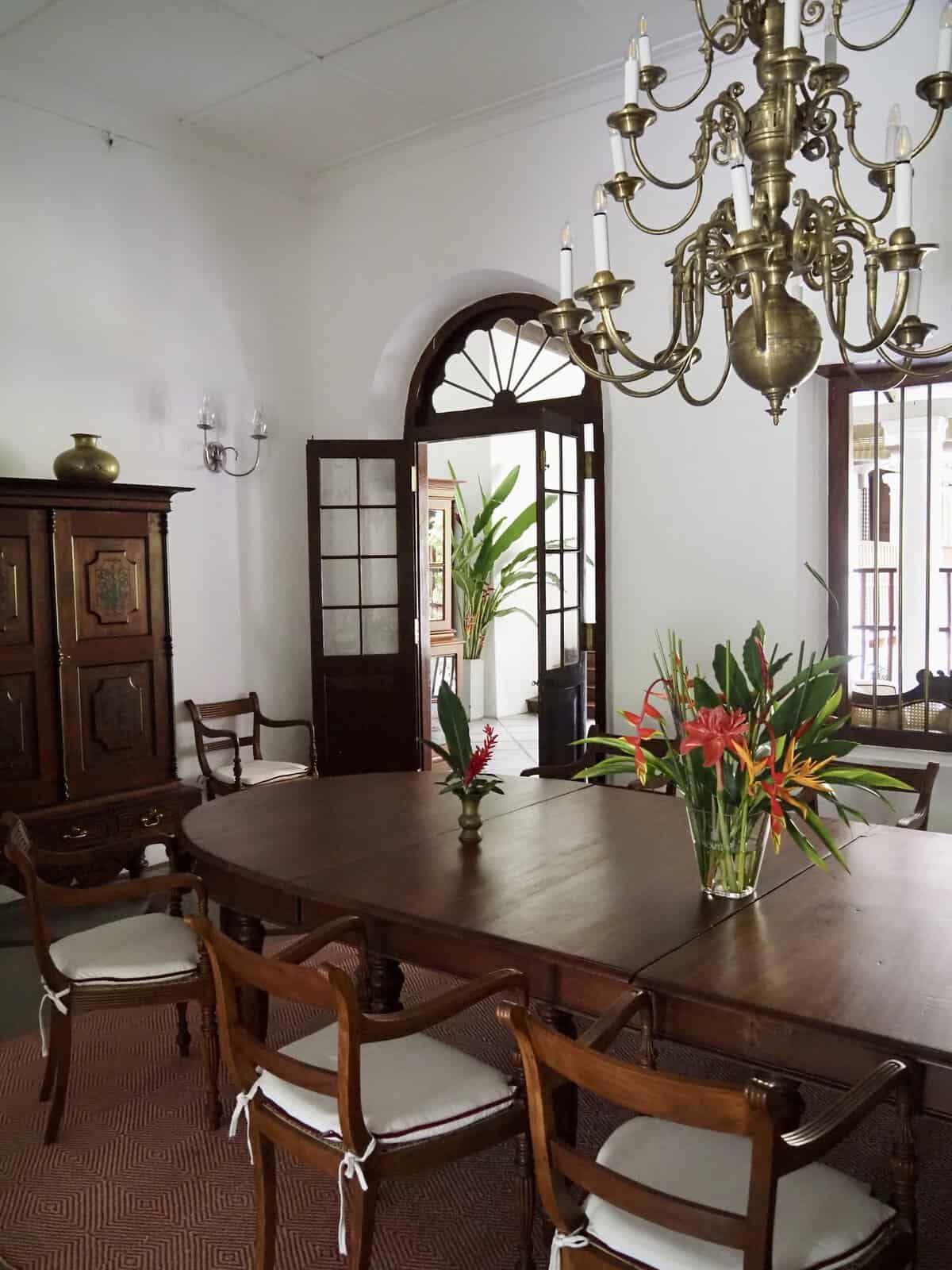 Adigar's Manor Dining room, Adigar's Manor boutique hotel, with Dutch brass chandelier and Anglo-Indian furniture.