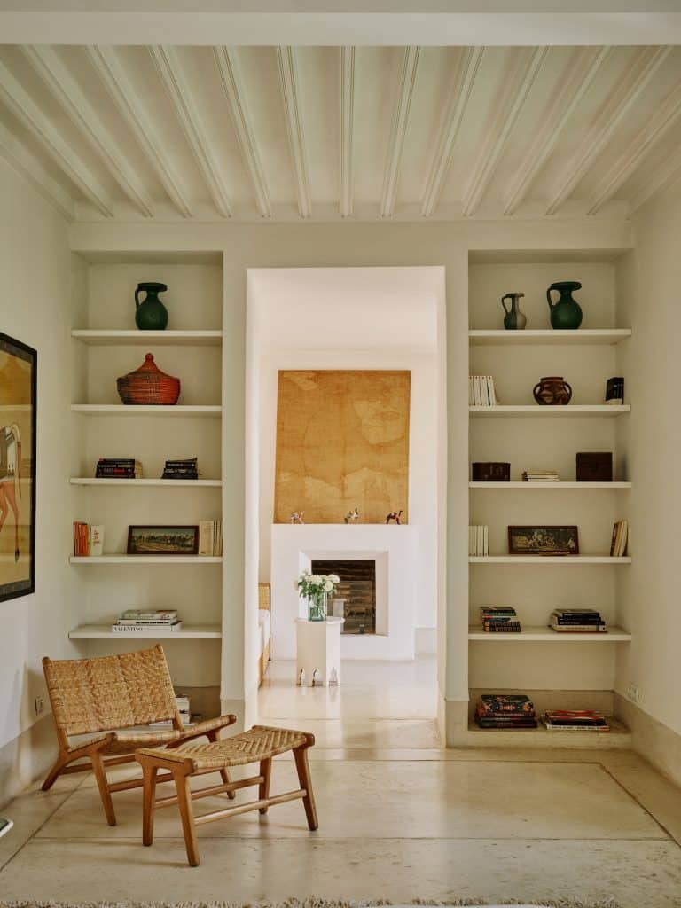 The clean lines of Moroccan vernacular architecture, with A Scandinavian chair and other eclectic furnishings at Riad Mena.