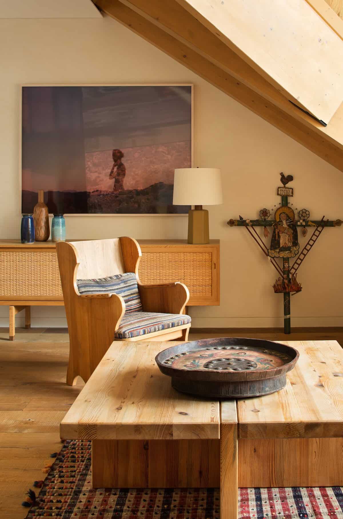 Axel Einar Hjorth. Eclectic interior in Andermatt, Switzerland by Pierre Yovanovitch, with armchair by Swedish designer Axel Einar Hjorth.