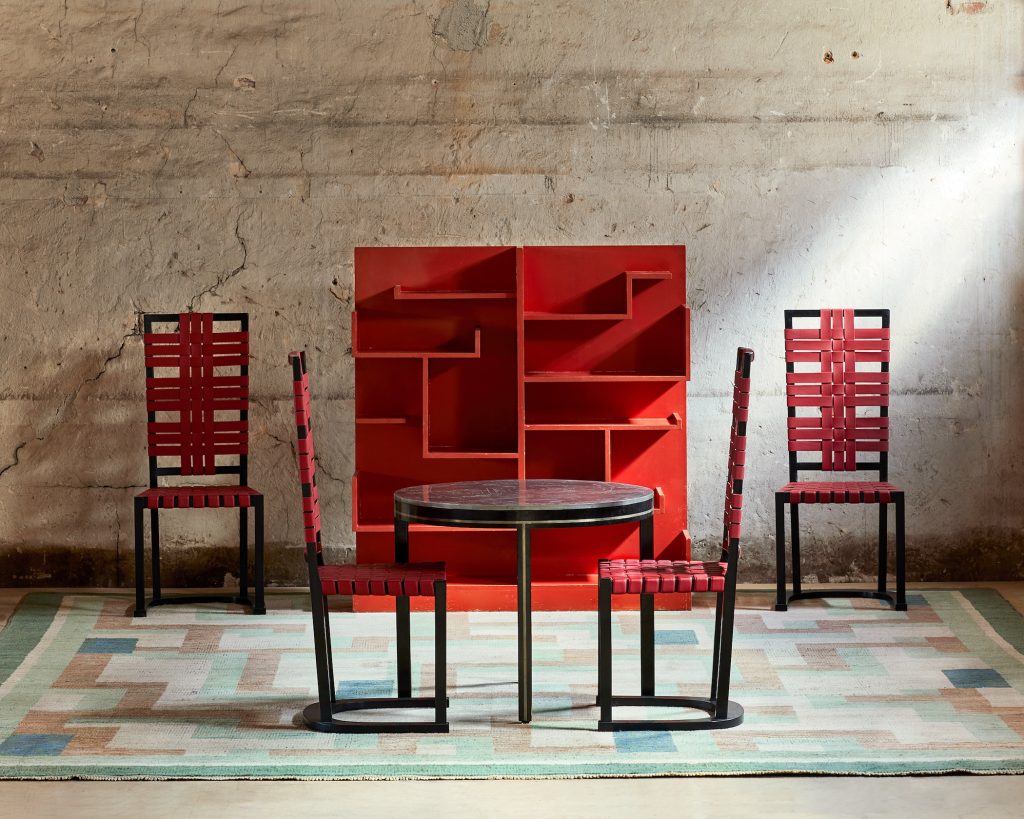 Axel Einar Hjorth. Futurum high-back chairs by Axel Einar Hjorth in black and red at Modernity, Stockholm.