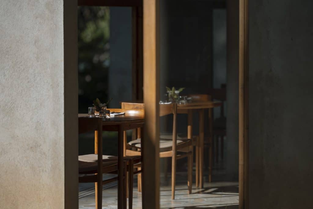 Scandinavian chairs in the dining area of Kurulu Bay's restaurant, The Kitchen.