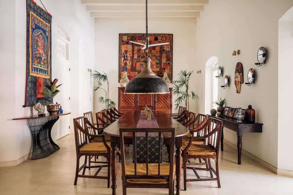 the-sun-house-galle-dining-room Long dining table with vintage Wolvendaal chairs & tapestry wall hanging, The Sun House Galle.